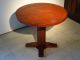 Antique round wooden game table with two glass holders, +/- 1960