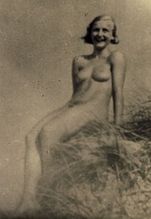 Unknown photographer, Naked girl enjoying the sun